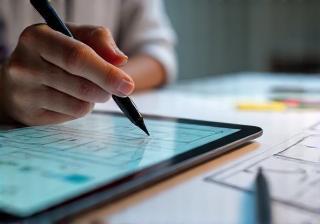 Designer prototyping mobile app interface